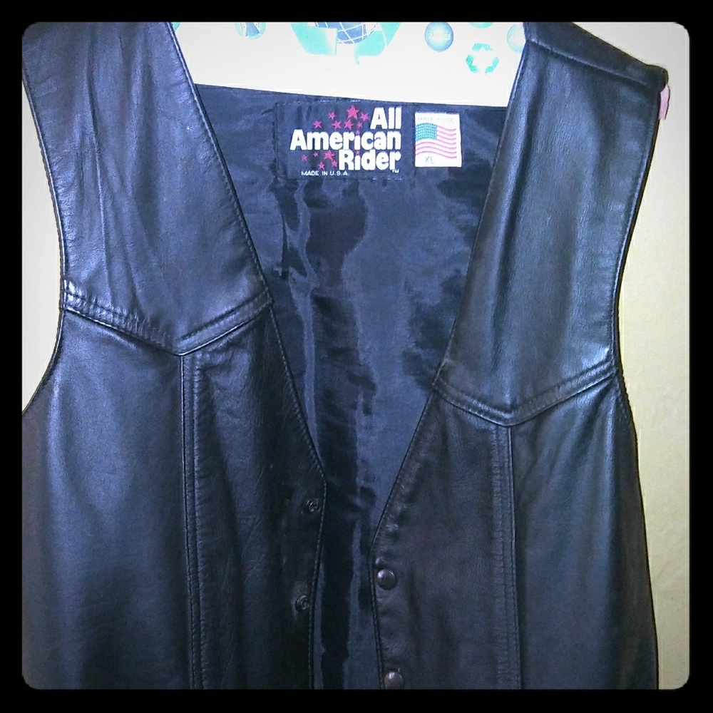 Black heavy duty motorcycle vest